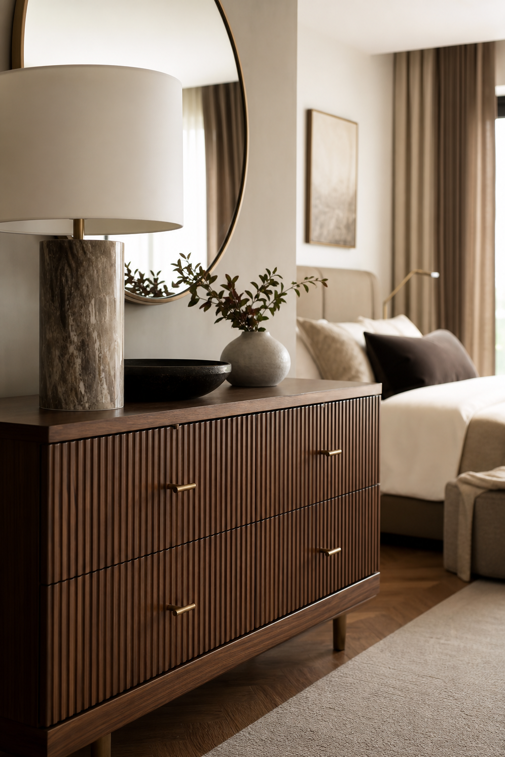 Fluted walnut dresser adding subtle texture to a modern bedroom