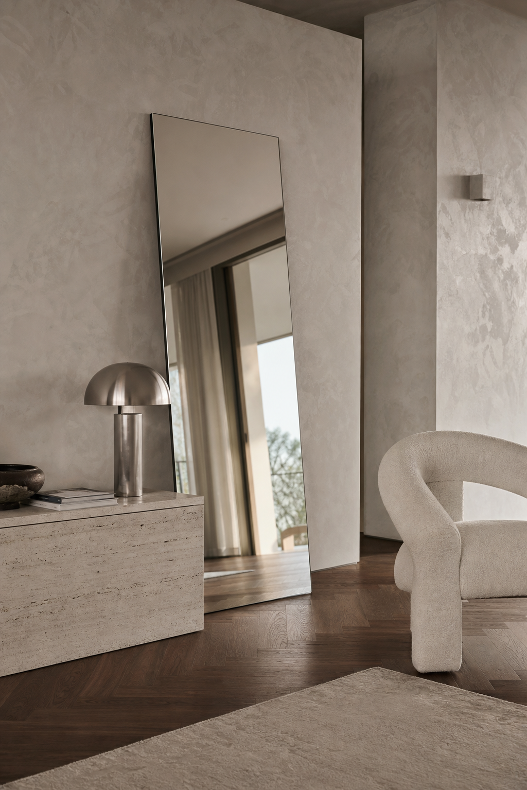 Minimal frameless standing mirror in a contemporary luxury room